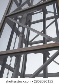 Steel structure of an elevator shaft mounted on the exterior wall of the building