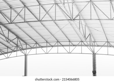 Steel structure Roof detail ,Indoor empty warehouse factory ,Curve line Steel structure Detail of Metal roof construction - Shutterstock ID 2154066805