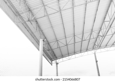 Steel structure Roof detail ,Indoor empty warehouse factory ,Curve line Steel structure Detail of Metal roof construction - Shutterstock ID 2154066807