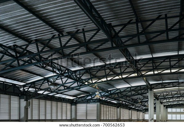 Steel structure of roof\
and metal roof for factory or warehouse modern style. Metal Roofing\
structure