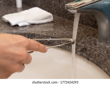 Steel Tongue Cleaner Under Water Tap