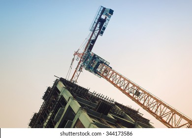 A Steel Tower And Apartment Scaffolding On A Construction Site