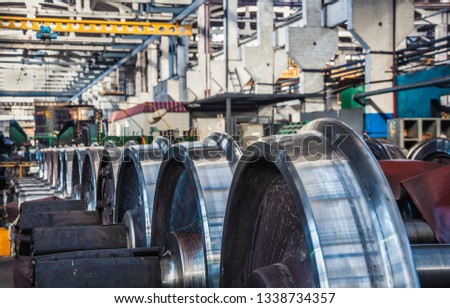 Steel train wheels production at warehouse