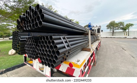 Steel Transport Cart Shelves With Structural Materials On Shelves In Warehouse Buildings. It Has High Contrast And Black And White Tones. Concept Transportation Company And Large Industrial Warehouse