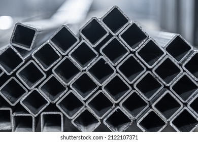 Steel Tube, Square High Carbon Metal Tube For Construction Site. Metallurgy Background.