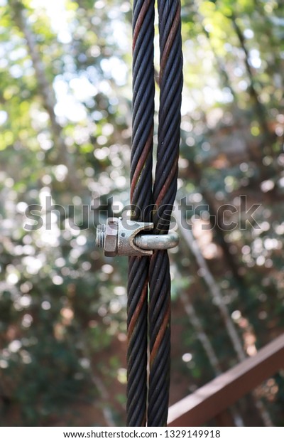 Steel Wire Rope\
Sling Clip on green\
nature.