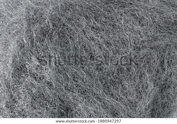 Steel wool strands texture. Abrasive material\
industrial background