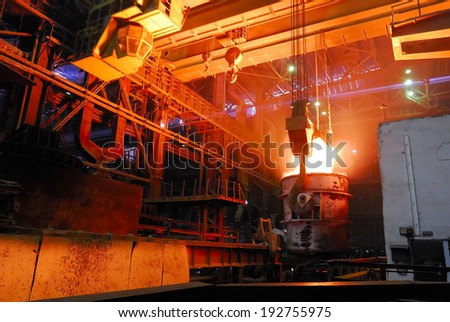 steel works, crane with stove busket