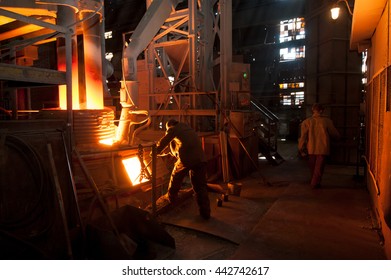 Steelworker Near A Arc Furnace