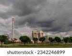 Steelworks buildings in Czestochowa cloudy sky over the factory chimney of the heating plant