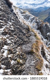 Steep Hiking Trail In The Swiss Alps Secured With A Chain