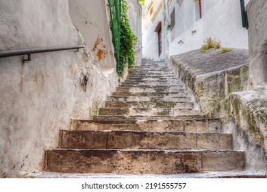 The steep staircase between the small houses of the village of Positano - Powered by Shutterstock