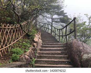 Steep stairs and trail perching on the cliff at Yellow Mountain