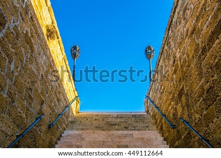 Similar – Blue railing on brick wall