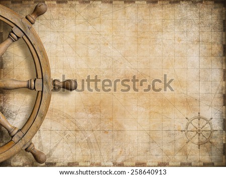 steering wheel and blank vintage nautical map background