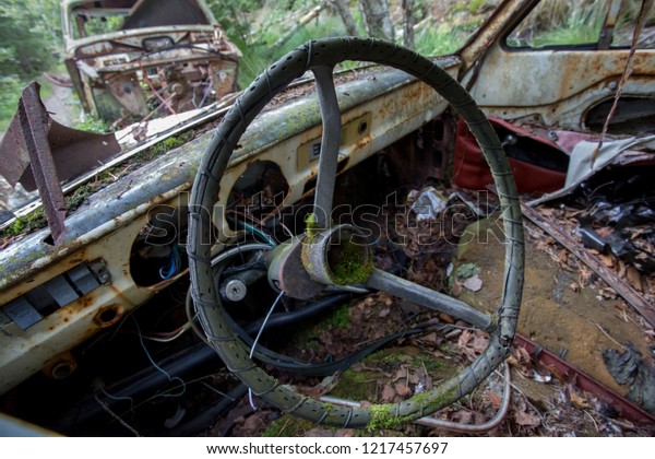 Steering wheel in car at scrap yard of Ryd, Kyrko\
Mosse in Sweden