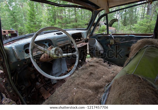 Steering wheel in car at scrap yard of Ryd, Kyrko\
Mosse in Sweden