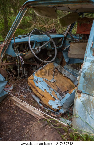 Steering wheel in car at scrap yard of Ryd, Kyrko
Mosse in Sweden
