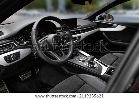 steering wheel close-up premium car. Leather interior of a business class car. High quality photo