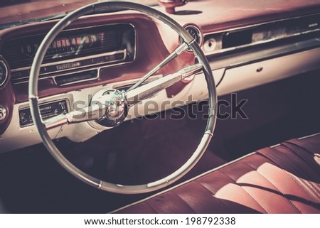 Steering wheel and dashboard  of a classic 1960s American Automobile