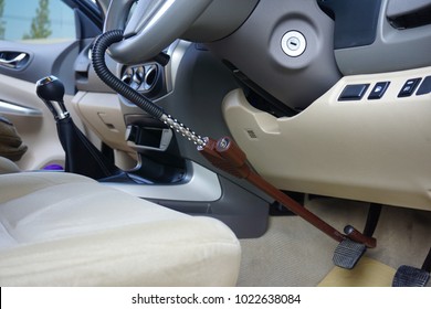 Steering wheel lock for car.
