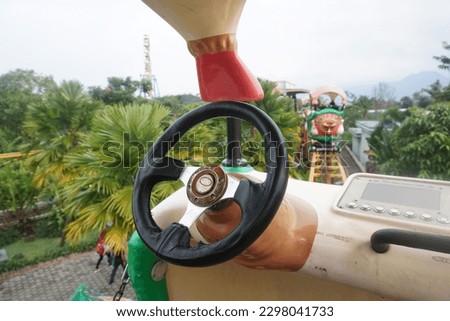 steering wheel on the game rides