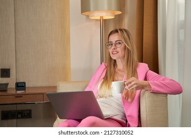 Stellar Young Lady Working Online At Fancy Hotel