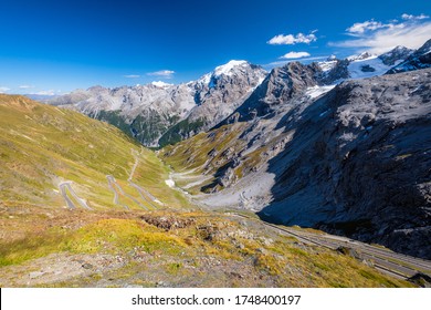 The Stelvio Pass is a mountain pass in the Ortler alps in South Tyrol (Northern Italy) and connects to the Swiss Umbrail pass towards the Val Müstair. It has a total of seventy-five hairpin turns