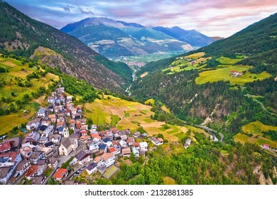 Stelvio village or Stilfs in Dolomites Alps landscape aerial view, province of South Tyrol in northern Italy.