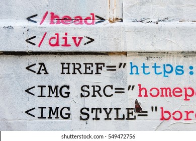 Stencil Of HTML Code On White Wall 