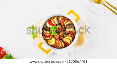 Step 5. Different vegetables. A healthy diet. Ingredients for baking. Vegetable ratatouille on a white background. flat lay