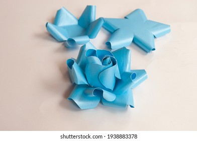 Step 6,  Paper 3 D Flower Make Origami Rose And  Handmade  Romantic Bouquet For Valentine, Wedding, Card, And Decorate Backdrop. Focus Blue Rose Paper On The White Background.