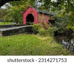 Step back in time and immerse yourself in the charm and beauty of the Carroll Creek Covered Bridge, a historic landmark that embodies the essence of rustic beauty. Located in Frederick, MD