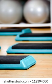 Step Board And Gym Balls In Aerobics Class