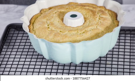 Step By Step. Baking Fail. Cooling Freshly Baked A Lemon Pound Cake On A Cooling Kitchen Rack.