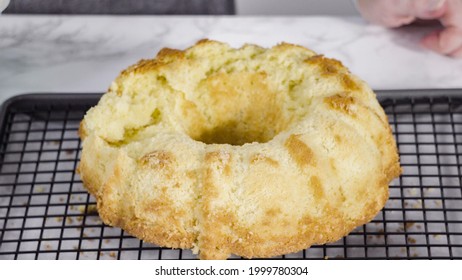 Step By Step. Baking Fail. Cooling Freshly Baked A Lemon Pound Cake On A Cooling Kitchen Rack.