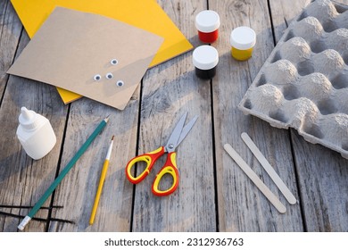 Step by step diy process. Step 1- preparation tools for handmade craft a honey bee toy from a cardboard egg tray. Creativity, crafting. Zero waste concept.