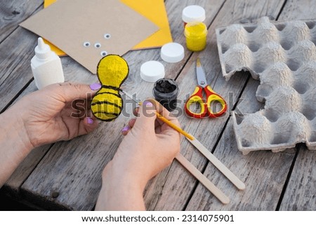 Step by step diy process. Step 4- using a brush and gouache, we paint the figure. Creativity, crafting. Zero waste concept.