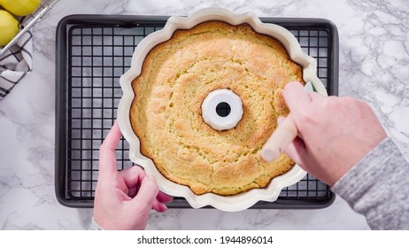 Step By Step. Flat Lay. Baking Fail. Cooling Freshly Baked A Lemon Pound Cake On A Cooling Kitchen Rack.