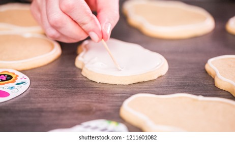 Step By Step. Flooding A Sugar Skull Cookie With White Royal Icing.