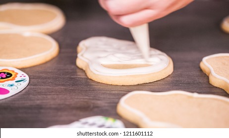 Step By Step. Flooding A Sugar Skull Cookie With White Royal Icing.