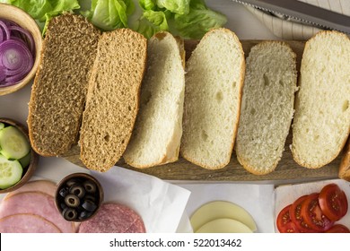 Step by step. Fresh sub sandwich on white and wheat hoagies. - Powered by Shutterstock