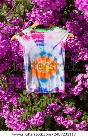Step by step. How to create a personal T-shirt with dry batik. Step 12 from 12.