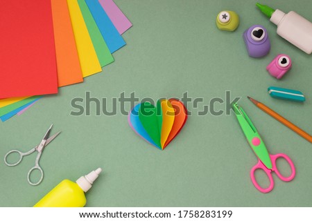 Step by step instructions. Hands with a rainbow heart. Step 4 It turns out a rainbow heart.