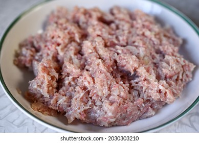 Step By Step Instructions. Step Three. How To Make A Puff Pastry Product With Meat At Home. Stir The Minced Meat And Onion. Ready Minced Meat On A Plate. Shallow Depth Of Field, Soft Focus.