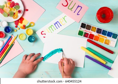 Step by step. Little girl draws pictures of summer.  Top view. - Shutterstock ID 640455124