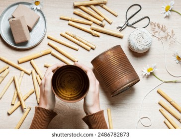 Step by step of  making a bug hotel from upcycled food cans which have rusted in the weather. Kids craft and helping wild animals concept.