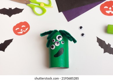 Step By Step Photo Instruction Halloween Craft. Step Handmade Decoration Cute Funny Monster From Toilet Paper Roll. Do It Yourself. Reuse Concept