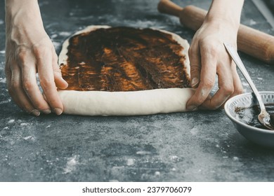 Step by step process of making cinnamon rolls dough at home. Holiday baking. High quality photo