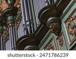 Step into the grandeur of Saint Sauveur Cathedral in Aix-en-Provence, France, where this captivating close-up photograph captures the majesty of a grand pipe organ. 